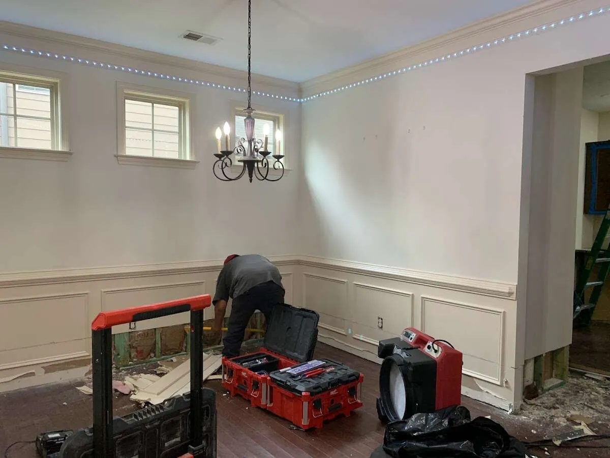Restoration technician with professional equipment in Chamblee